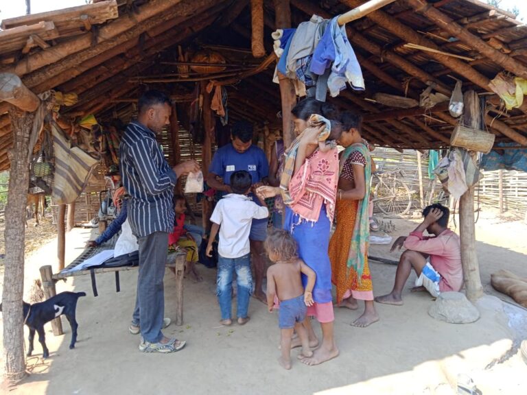 A family and community visit in a rural home