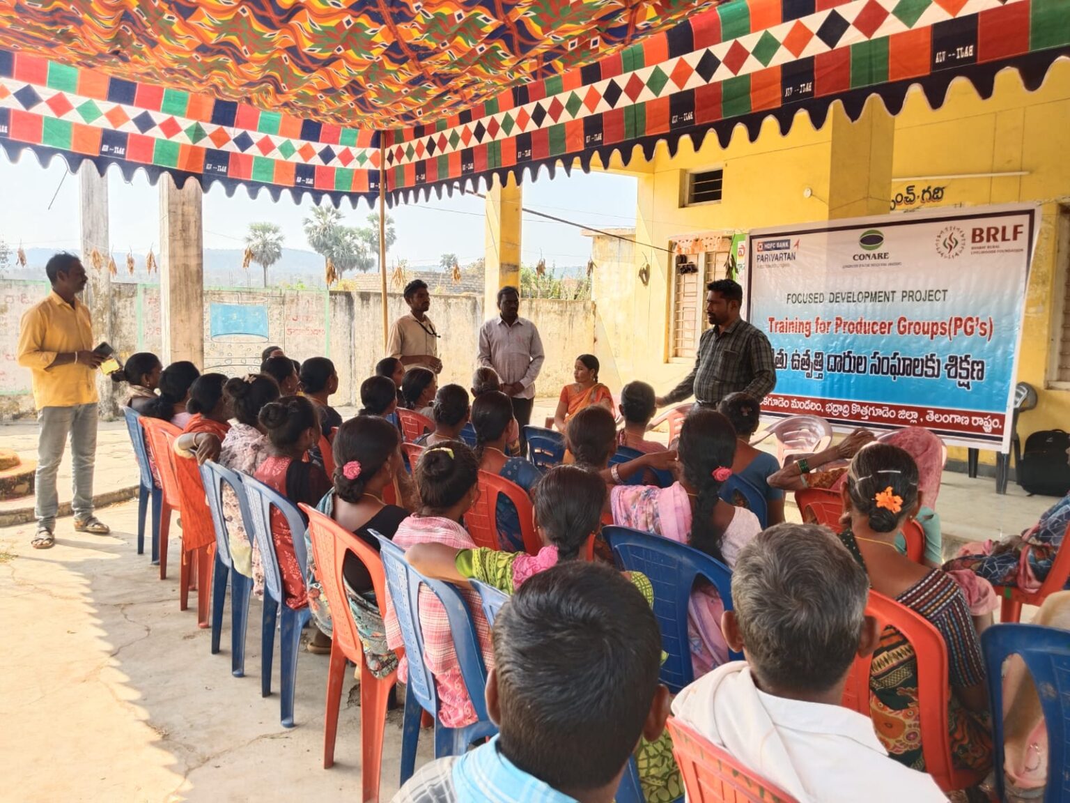 Community members attending a development programme